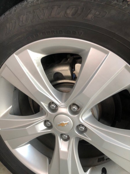 Chevrolet Captiva LTZ model 2013, màu đen.