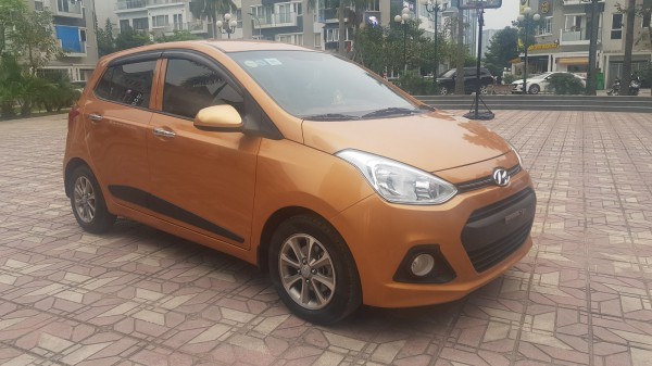 Hyundai i10 Bán Hyundai Grand I10 1.2AT màu cam 2016