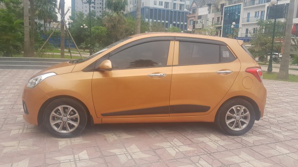 Hyundai i10 Bán Hyundai Grand I10 1.2AT màu cam 2016