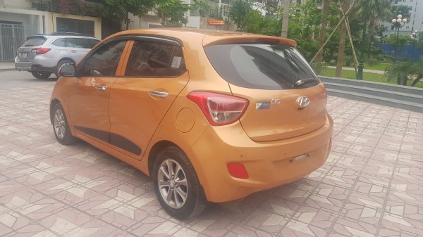 Hyundai i10 Bán Hyundai Grand I10 1.2AT màu cam 2016